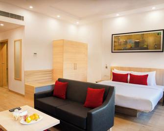 Red Fox by Lemon Tree Hotels, Dehradun - Dehradun - Schlafzimmer