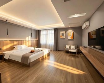 Nides Art Hotel - Shaoyang - Bedroom