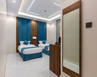 العاتكة للشقق الفندقية - Medina - Bedroom