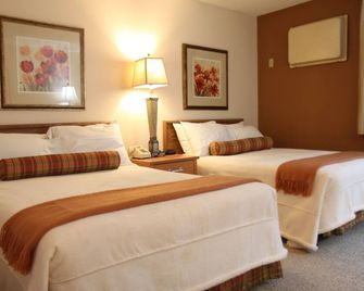 Brentwood Inn & Suites - רוצ'סטר - חדר שינה