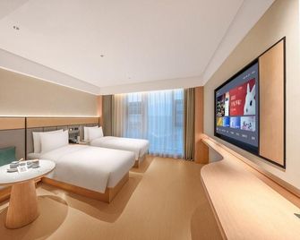 Ji Hotel Muli Garden - Liangshan - Schlafzimmer