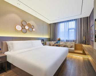 Orange Hotel Ningbo Railway Station - Ningbo - Slaapkamer