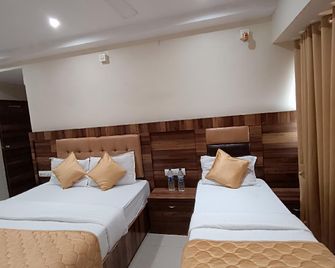 Rk Hotel - מומבאי - חדר שינה