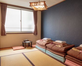 J-Hoppers Hiroshima Guesthouse - Hostel - Hiroshima - Schlafzimmer