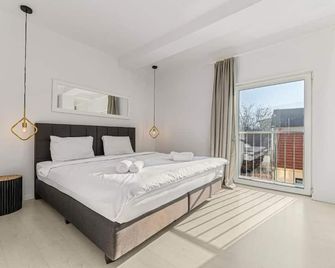 モホスト ハーモニー アパートメント - シティセンター - ブラショフ - 寝室