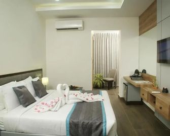 Park Iris Hotels, Mg Road - Vijayawada - Schlafzimmer