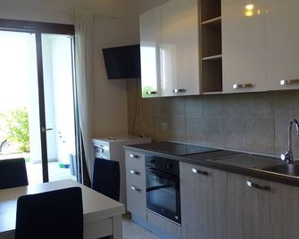 Residence San Bull - Metaponto - Кухня