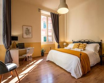 Family Apartments Angeli - Genova - Makuuhuone