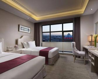 Holiday Inn & Suites Hulunbuir - Hulunbuir - Спальня