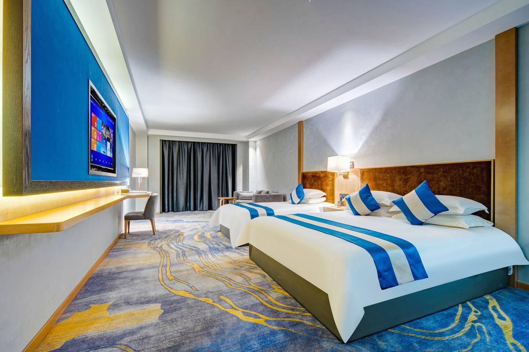 Desheng Hotel - هولونبوير - غرفة نوم