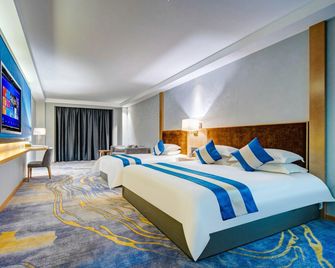 Desheng Hotel - هولونبوير - غرفة نوم