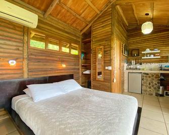 Horizon Hotel & Yoga center - Santa Teresa - Schlafzimmer