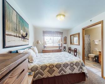 Riverfront condo with free wifi, fireplace, patio, & gas grill - Grand Lake - Спальня
