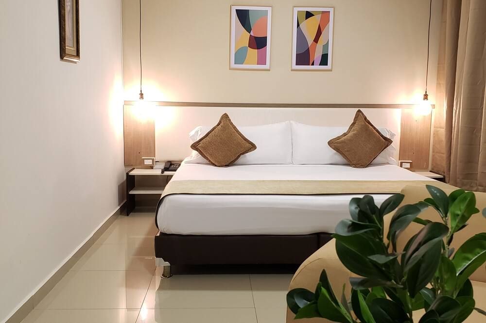 هوتل سويت سنتر - بيريرا - غرفة نوم