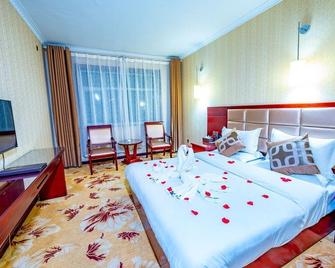 Kaitong Building - Jiayuguan - Slaapkamer