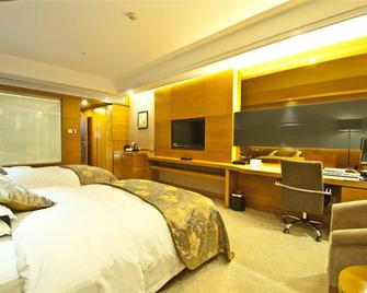 Taoranju Hotel - Linyi - Bedroom