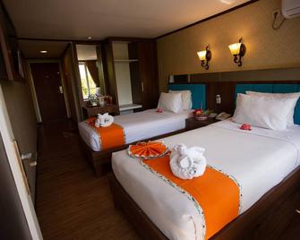 Royal Caravan Trawas Hotel - Trawas - Bedroom
