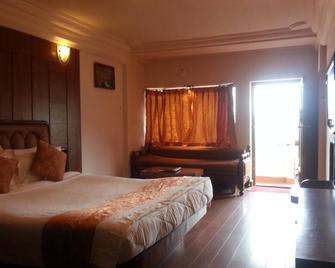 Hotel Darshan - Ooty - Bedroom
