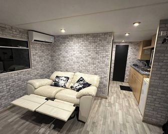 Private lakeside mobile home lac Beaumont - Bosset - Living room