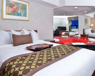 Lexington Inn & Suites-Windsor - ווינדזור - חדר שינה