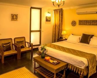 Purple Hotels Resorts - Auroville - Bedroom