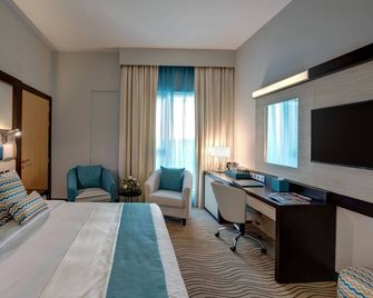 City Avenue Hotel - Dubaj - Ložnice