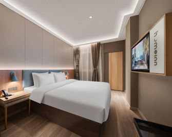 Home Inn Neo Hangzhou East Railway Station Zhejiang University Huajiaci Genshan West Road - Hangzhou - Habitación