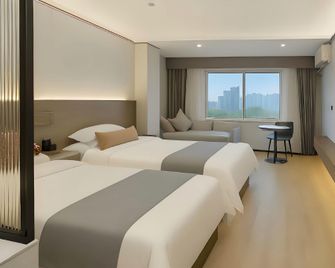 Hainan Tengpeng Hotel - Haikou - Camera da letto