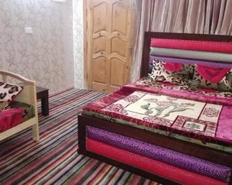 Greenland Motel - Mānsehra - Bedroom