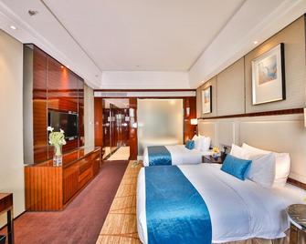 Jianghai Country Garden Phoenix Hotel - Jiang Men - Спальня