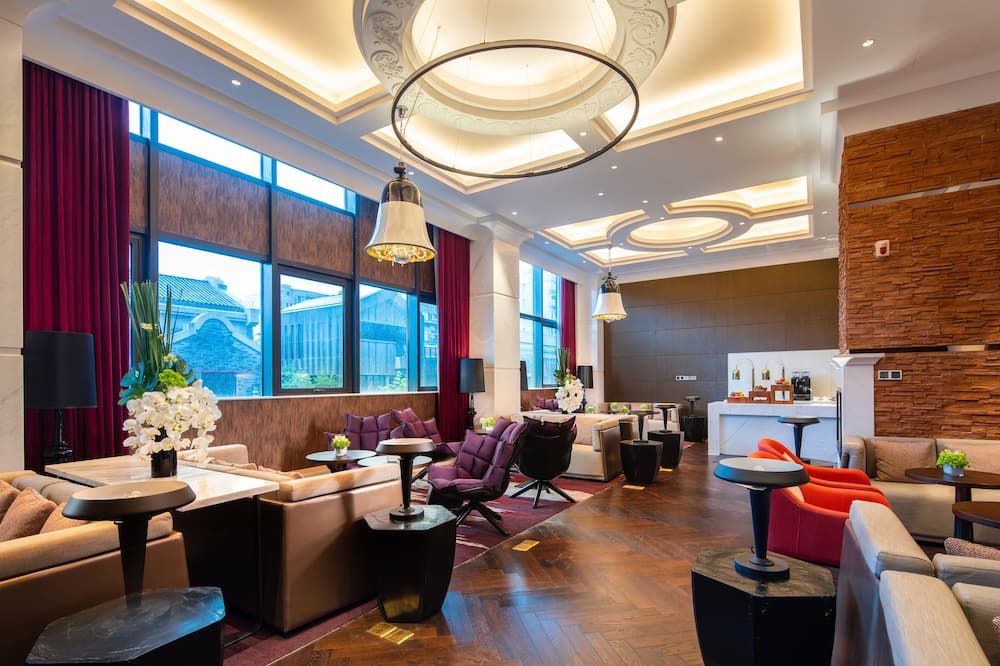 Rocase Boutique Hotel Wuxi - Wu-si - Salónek