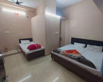 Hotel Maa Aarti Palace - Ujjain - Habitación