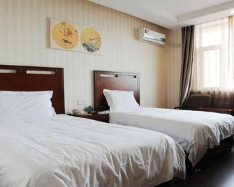 Greentree Inn Shanxi Yangquan Municipal Government Express Hotel - Yangquan - Спальня