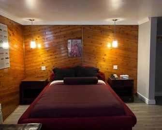 Motor Court Motel - לונדון - חדר שינה