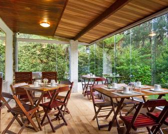 Villa Vintage Campos - Piscina e opções de suites com hidromassagem - Campos do Jordão - Restaurante