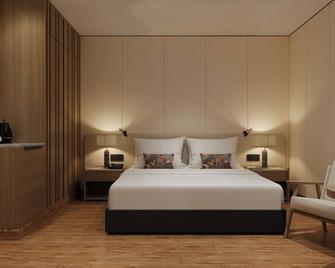 Hoang Kim Hotel - Vientiane - Yatak Odası