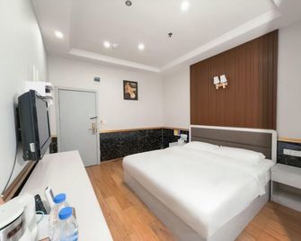 Nanchong Jiafeng Hotel (Jialing Bus Station Branch) - Nanchong - Camera da letto