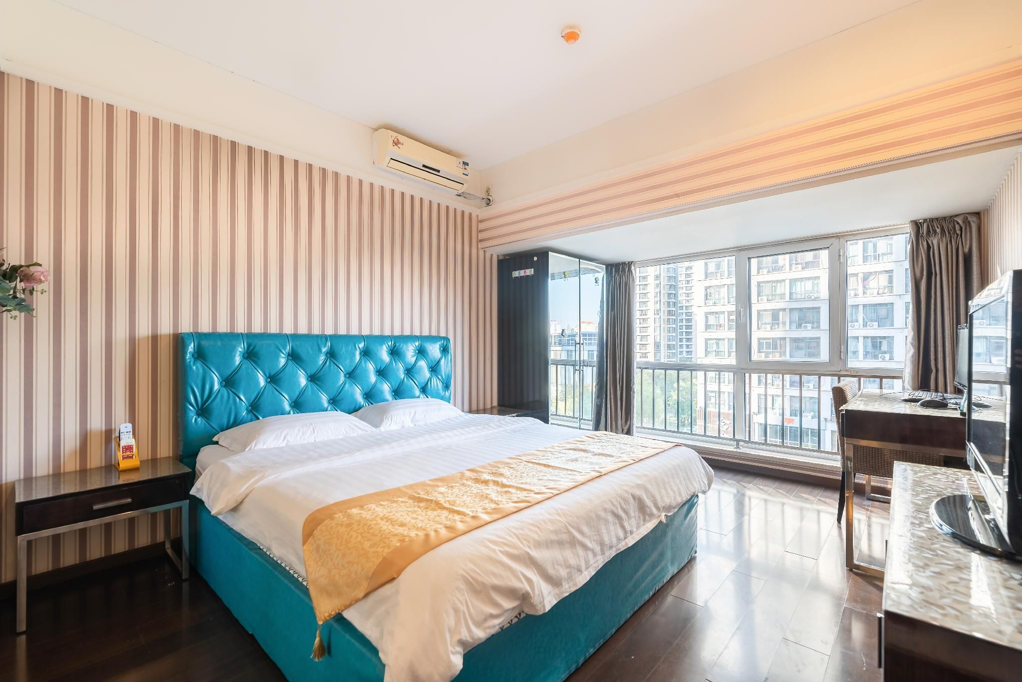 Tianjin Shidai Aocheng Tiantian Apartment - تيانجين - غرفة نوم