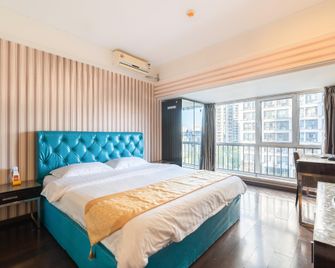 Tianjin Shidai Aocheng Tiantian Apartment - تيانجين - غرفة نوم