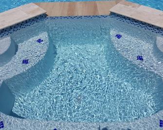 We are ready to host you at our paradise beach condo.br - Río Grande - Piscina