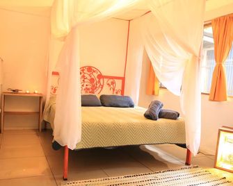 Madre Selva Hostel - פוארטו וויחו דה טלמנאקה - חדר שינה
