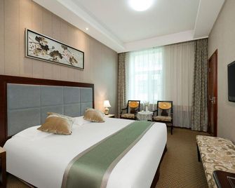 Chunyi Hotel - Changchun - Habitación