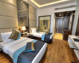Hotel Delite Grand - Faridabad - Bedroom
