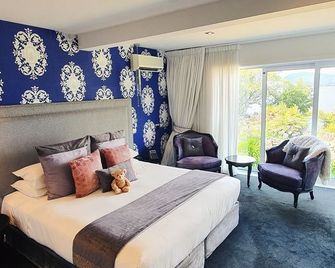 Black Swan Lakeside Boutique Hotel - Rotorua - Κρεβατοκάμαρα