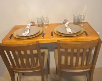 TinyUrb - Experience a modern tiny house - Chaguanas - Dining room