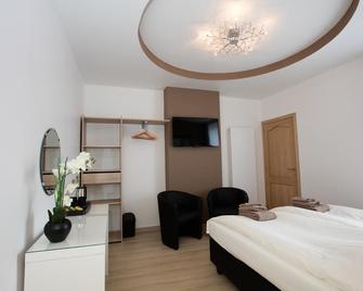 Elysian - איפר - חדר שינה