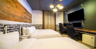 Ulsan Samsan Alibaba Hotel - Ulsan - Bedroom