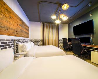 Ulsan Samsan Alibaba Hotel - Ulsan - Bedroom