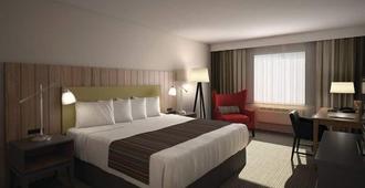Country Inn & Suites by Radisson, Jackson, TN - Jackson - Schlafzimmer