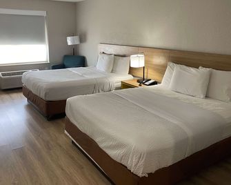 Days Inn by Wyndham Dallas Garland West - Garland - Ložnice